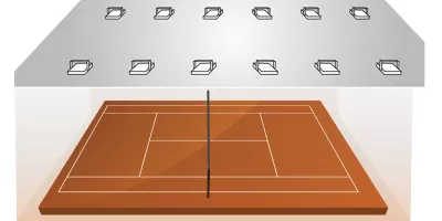 How to light indoor tennis courts with bilateral implantation